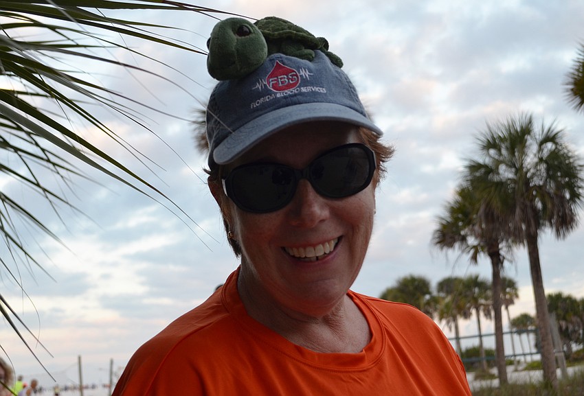 Dori Law shows off her turtle friend on her hat.