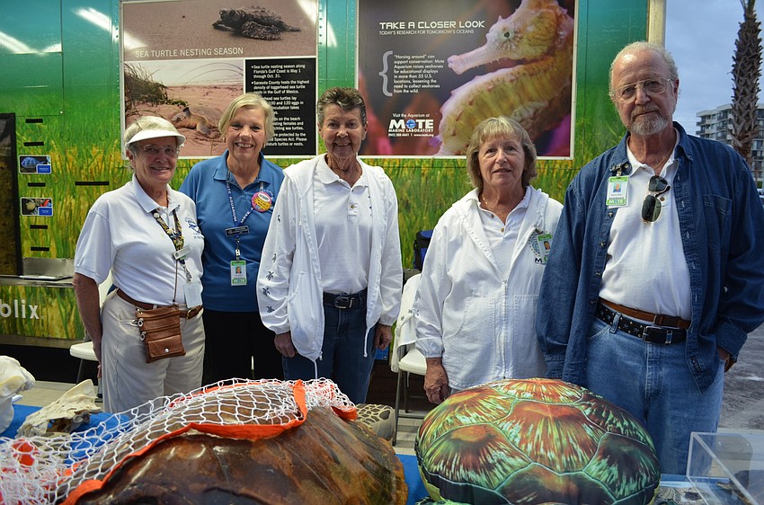 Mote Marine Laboratory & Aquarium volunteers Doris Anne Lucia, Sue Stolberg, Diane McKissick, Lillian and Dennis Riley were there to educate guests on sea turtle conservation.