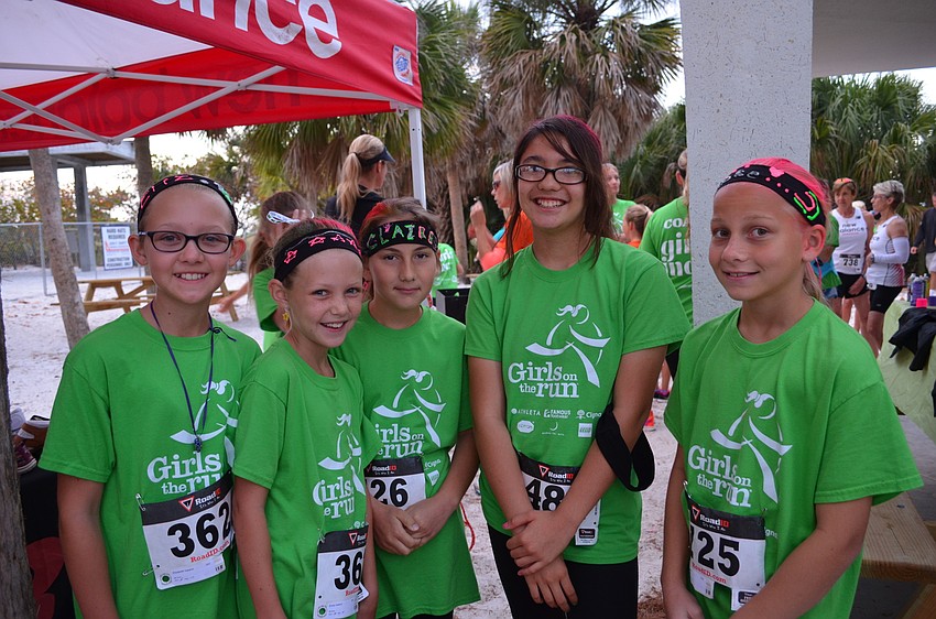 Members of the Girls on the Run group Elizabeth and Emily Ireland with Claire Taylor, Kaya McCue and Brooke Taylor.
