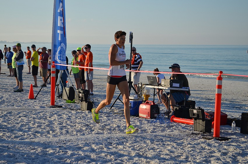 Overall female winner Heath Butcher crosses the finish line.