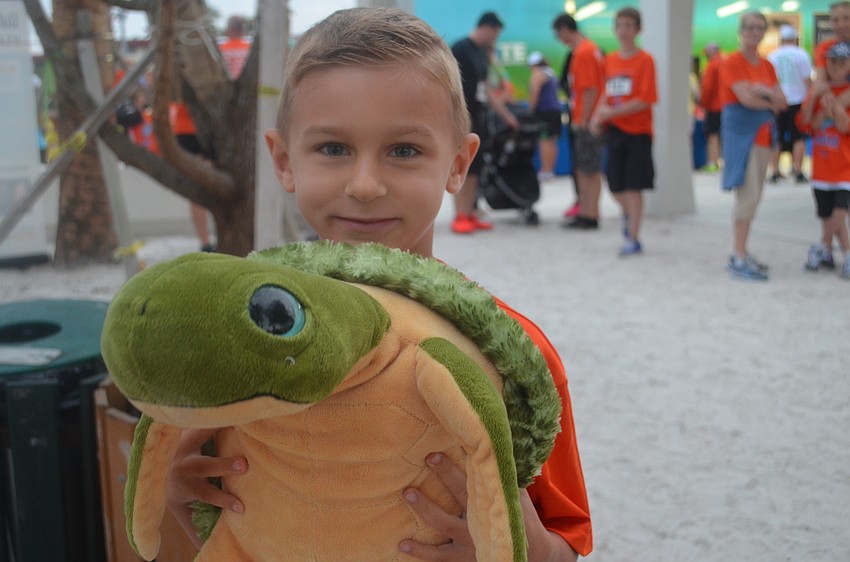 Reece Lanum brought his turtle to the race.