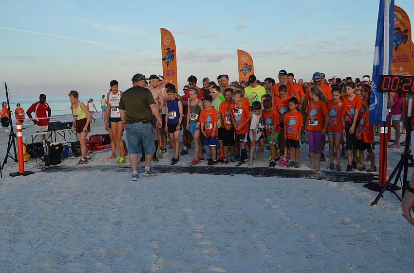 Runners take their places before the start of the race.