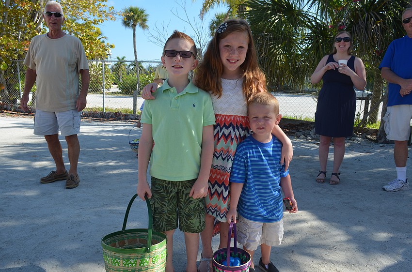Nickolas, 8, and Elise, 10, Elwell with CJ Schmitz, 3