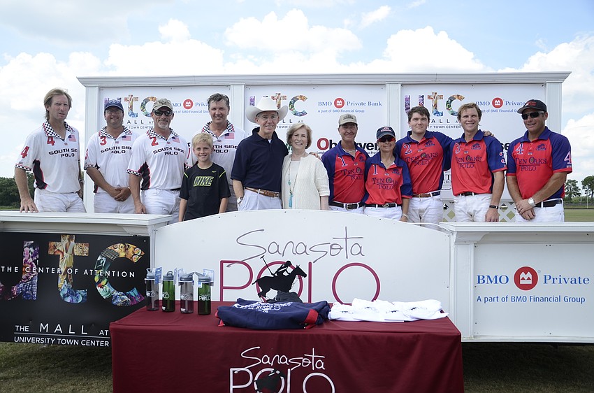 Matt and Lisa Walsh, Editor and CEO and Vice President of Observer Media Group, with the teams.