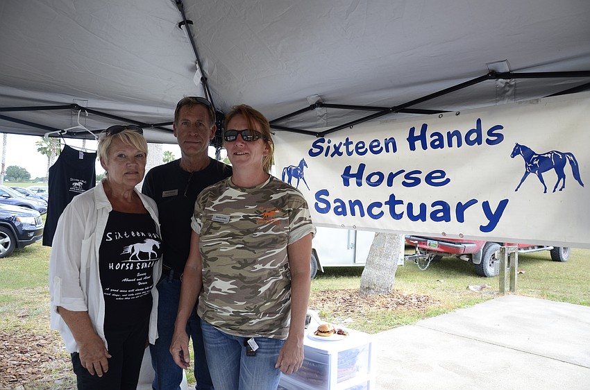Barb Walters, Gary Fresch and Robin Cain with the Sixteen Hands Horse Sanctuary