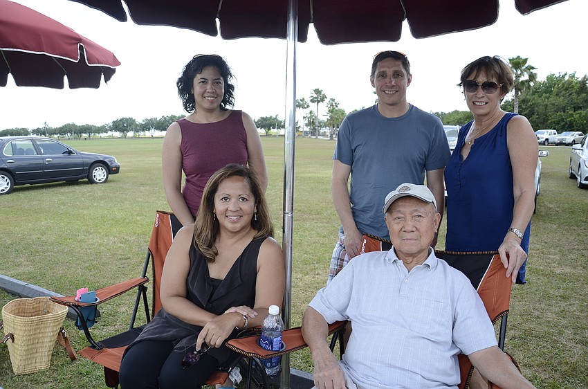 Beverly Arias with her daughter Jasmine and father, Ruben, and friends Steven Farrenkopf and Terri Fellows.