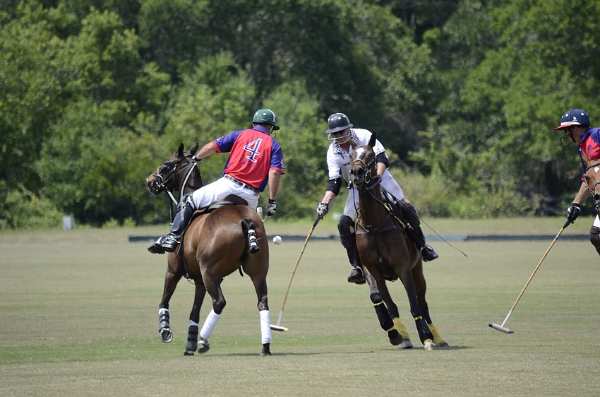 Brent Mirikitani, Twin Oaks rider, tries to get the ball back from South Side.