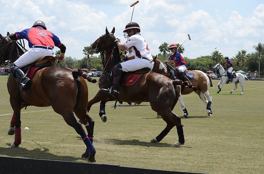 Raymond Guest steals the ball from the sidelines during Sunday's match.