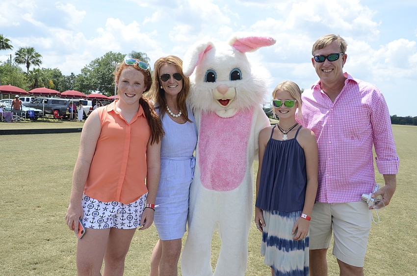 Zoe, Karin, Sophie and Bar Leereveld with the Easter bunny, who appeared at half time.