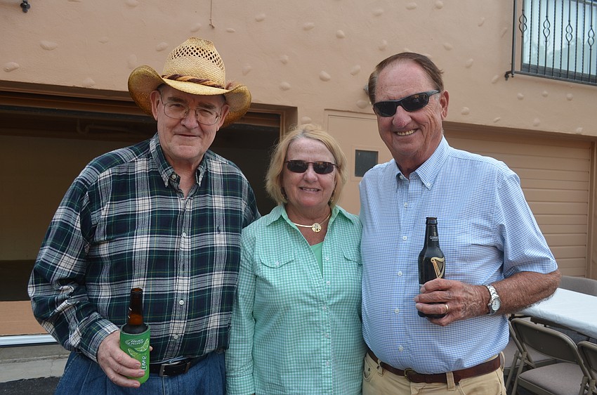 Msgr. Gerry Finegan and Sharry and Pete Hupkins