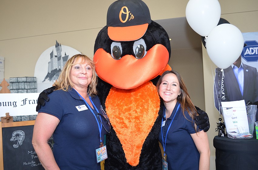 Christine Sunseri and Tina Gilson with the Oriole Bird.