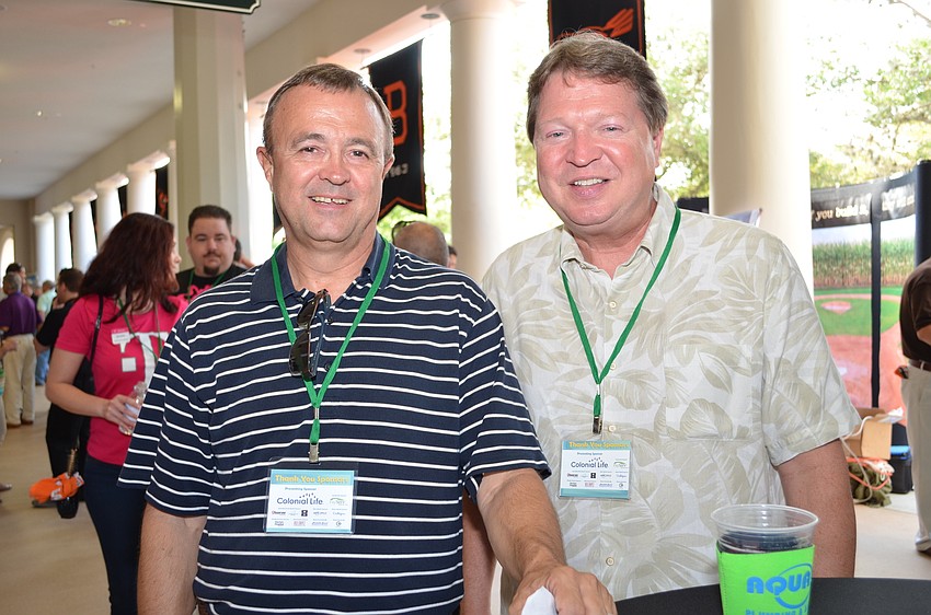 Jerry Crawford, Aladdin Equipment Company and Mike Bietzinger, Iberia Bank.