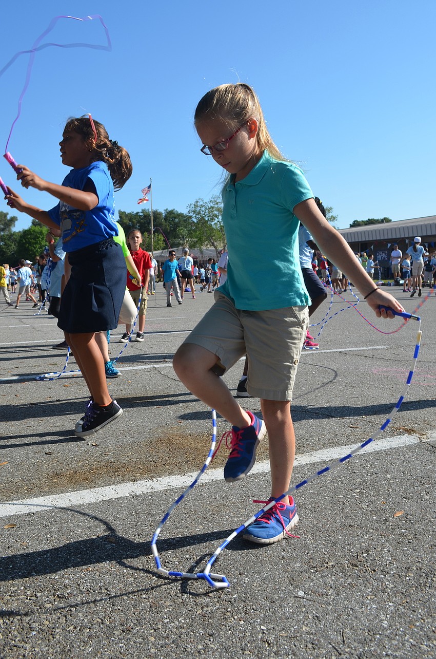 Eight-year-old Malaina McLean gets ready to start her morning jumping rope.