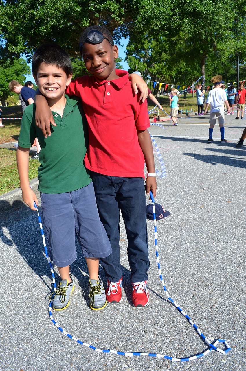 Jake Ronan and Chevin Edwards take a break from jumping rope.