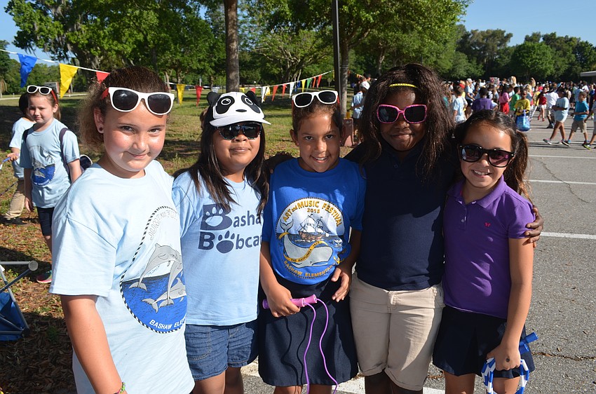 Keegan Skinner, Alejandra Bernachi, Natalie Benedek, Alanna Houston and Natalee Tison make their own shade with sunglasses and hats.