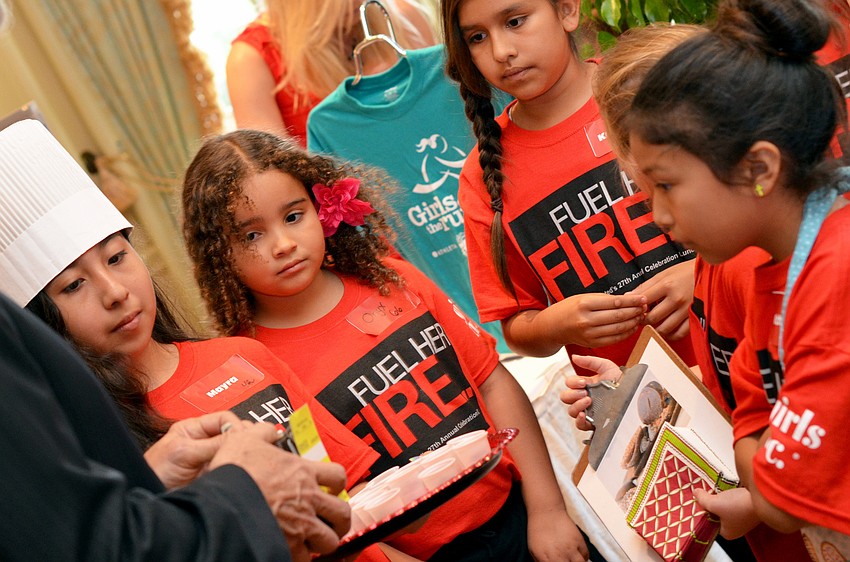 Girls Inc. girls sell their handmade items to guests at the 27th annual Girls Inc. Celebration Luncheon.
