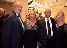 Friends Donald and Debbie Reaves, and Bill and Ronnie Lytle show support for the Sarasota chapter of the Sigma Pi Phi fraternity.