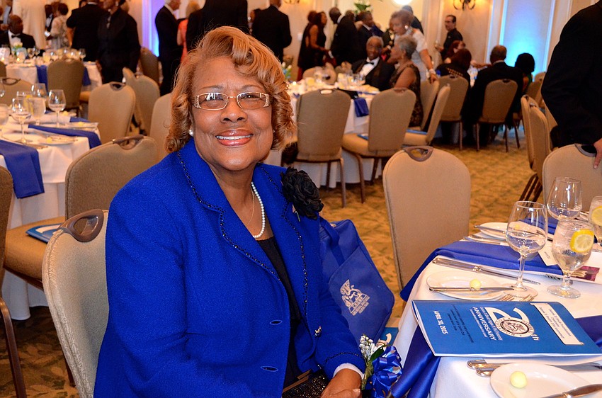 Yvonne Brown shows support for her husband, who was the first president of the local Sigma Pi Phi chapter.