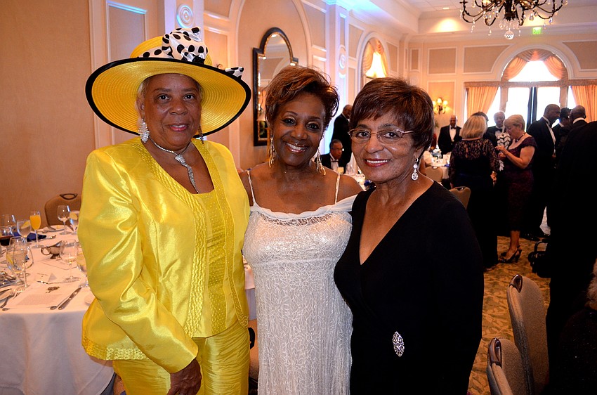 Barbara Robertson, Beverlyn Truehart and Sue Walker how off their formalwear before dinner.