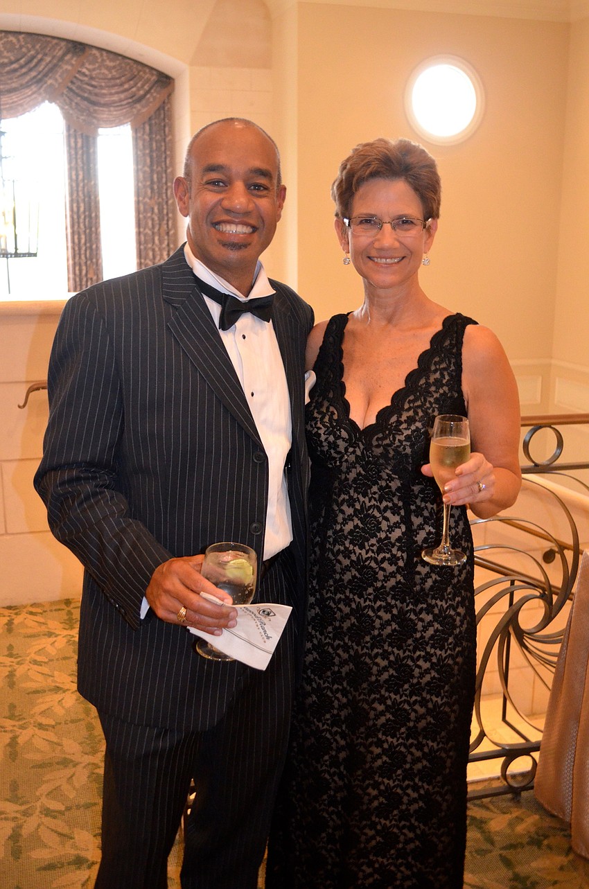 John and Sandra Wilkey toast to a fun evening.