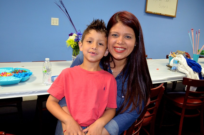 Noah and Keila Horne find the snack table after playing games.