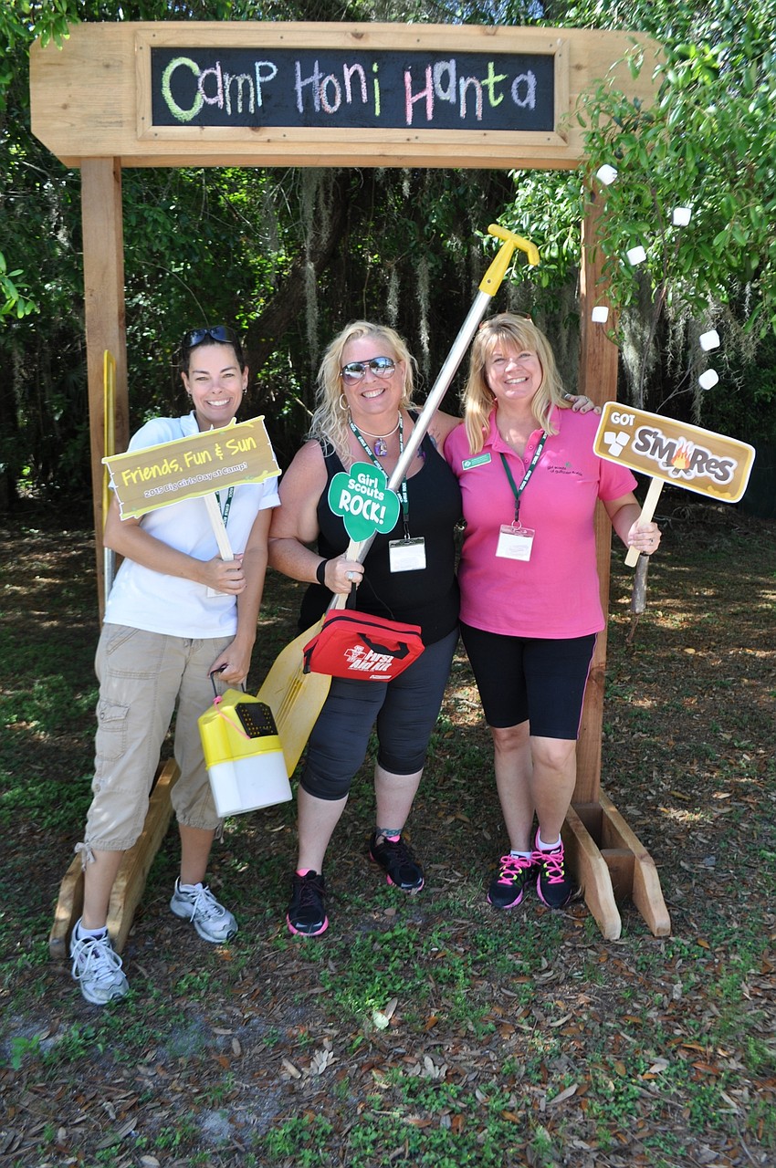 Girl Scouts Marketing Manager Julie Krueger, volunteer Annie Barker and Girl Scouts’ Director of Corporate Communication Patricia Ramthum pose at the photo booth.