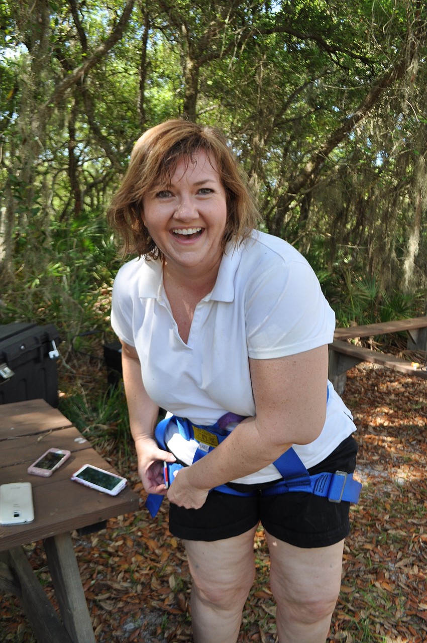 Morgan Gerhart  says “It was blast,” as she takes off her rock climbing gear.