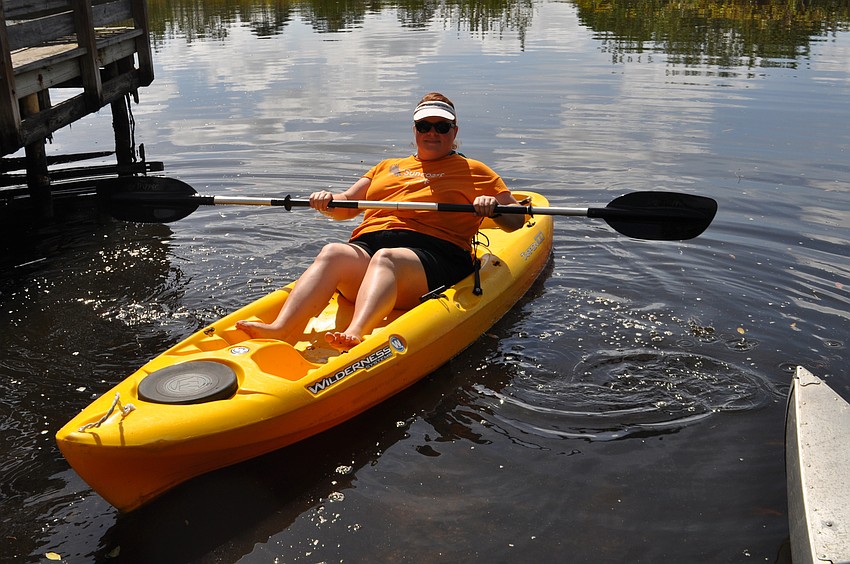 Meghan Campbell launches into the river. She’s been involved in the Girl Scouts for 30 years.