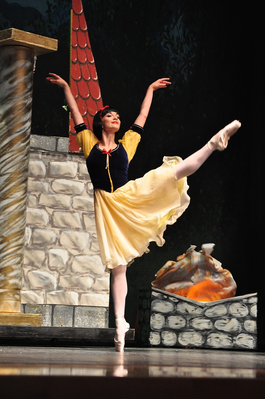 Lauren Henry, as  Snow White makes her first appearance, at which time she is visited by the dwarfs and forest creatures.