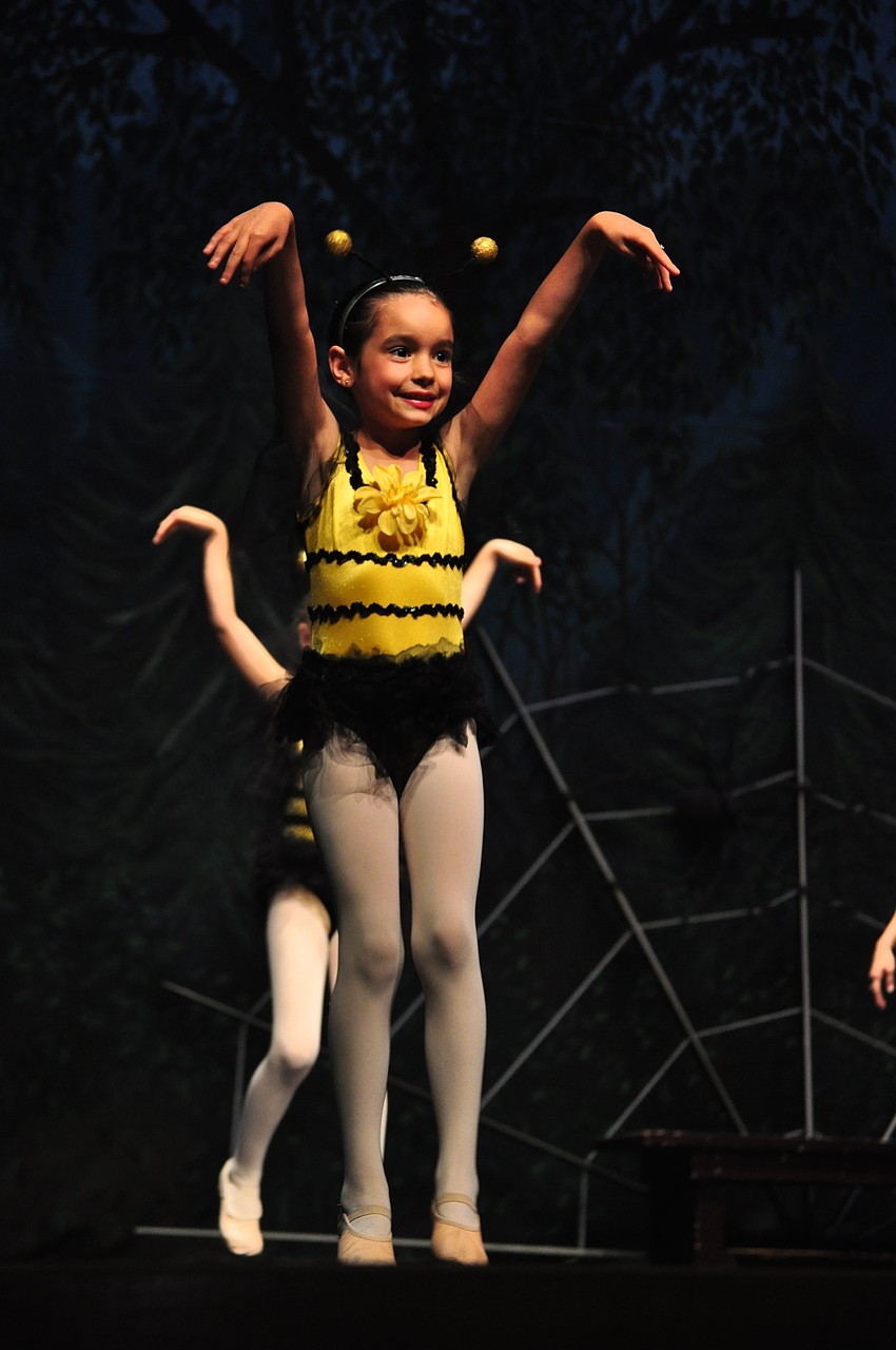 Gabriella Bunch, a bee, buzzes with excitement.