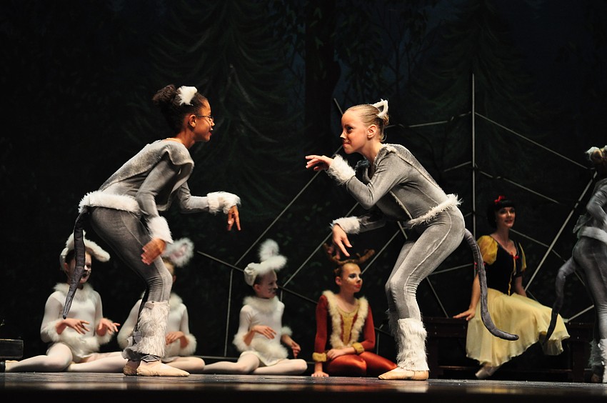 Cats Charlotte Blake and Olivia Fontaine dance for Snow White in the woods.