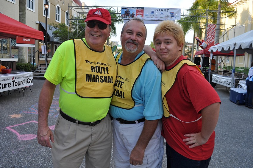 Kevin McMenemy, Jerry Johnson and Gabriel Nickell serve as route marshalls.