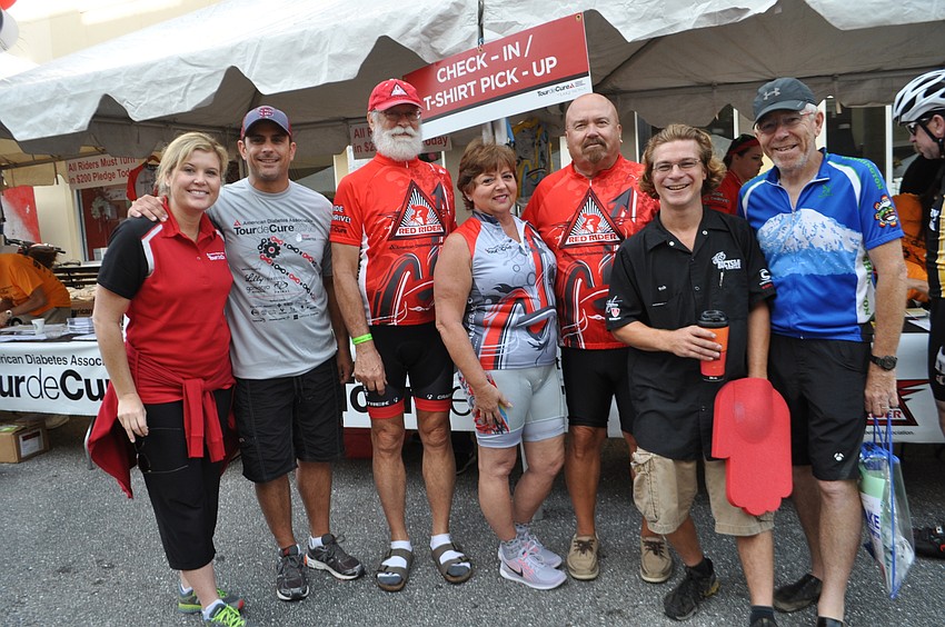 Tour de Cure event staff Carley Zampiceni poses with her husband, Craig, and riders Wayne Palmer, Brenda and Phil Menendez, Rob Dunaway (support) and Curtis Miller.