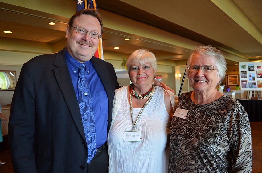Curator for the Ca‘dZan Ron McCarty, Sarasota Garden Club First Vice President C.J.Danna and assistant secretary Kay Weber