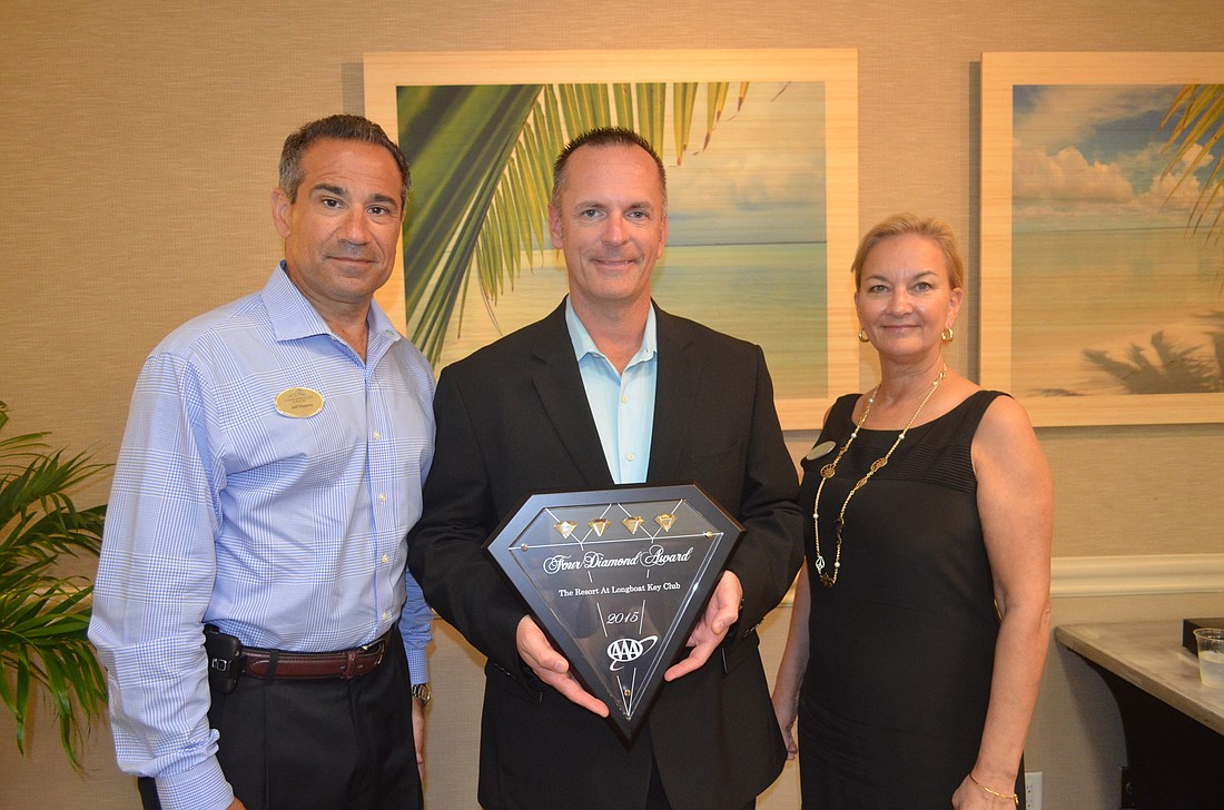 Resort at Longboat Key General Manager Jeff Mayers, AAA Field Manager Don Schwartz and Resort at Longboat Key Director of Communications Sandra Rios