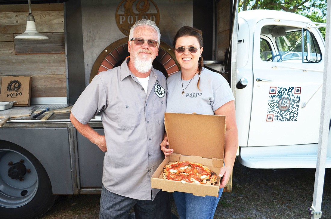 Tom Baril and Danni Bleil produce personal pizzas packed with fresh ingredients around Sarasota. Photos by Nick Reichert.