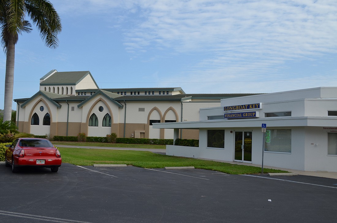 The office building at 6350 Gulf of Mexico Drive houses five tenants. Eventually, the church will transition the building to its own office space and a meeting facility for church members. Photo by Kurt Schultheis