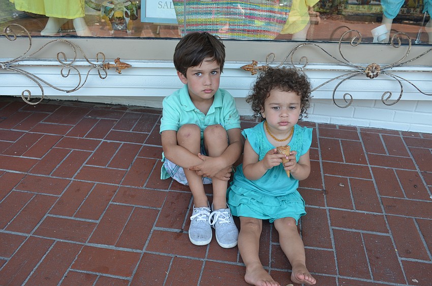 Deven, 4, and Vira, 2, Shah. “I love it,” Deven Shah said. “I like the chocolate and the Superman flavor.”