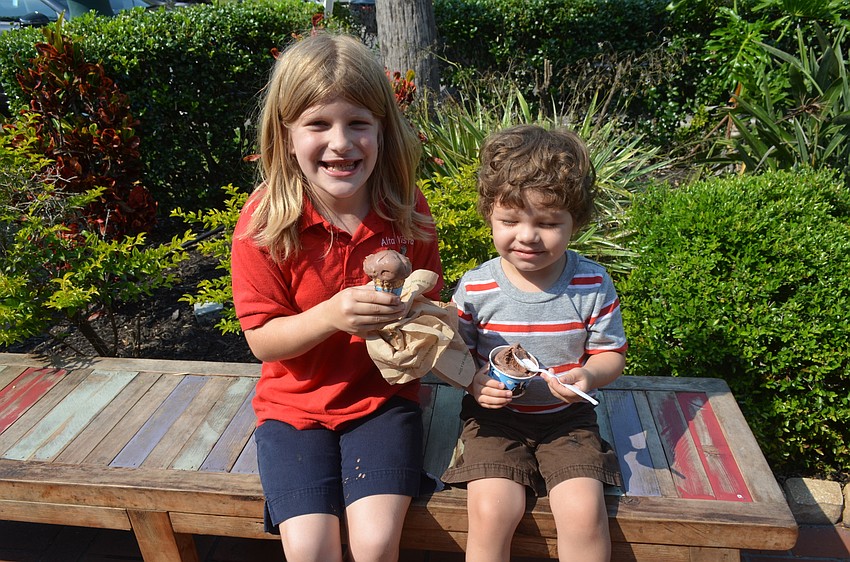 Lillian, 8, and Joah, 2, Martin. “When it’s on a hot day, it’s cold and cools you off,” Lillian Martin said. Both siblings’ favorite ice cream flavor is chocolate.