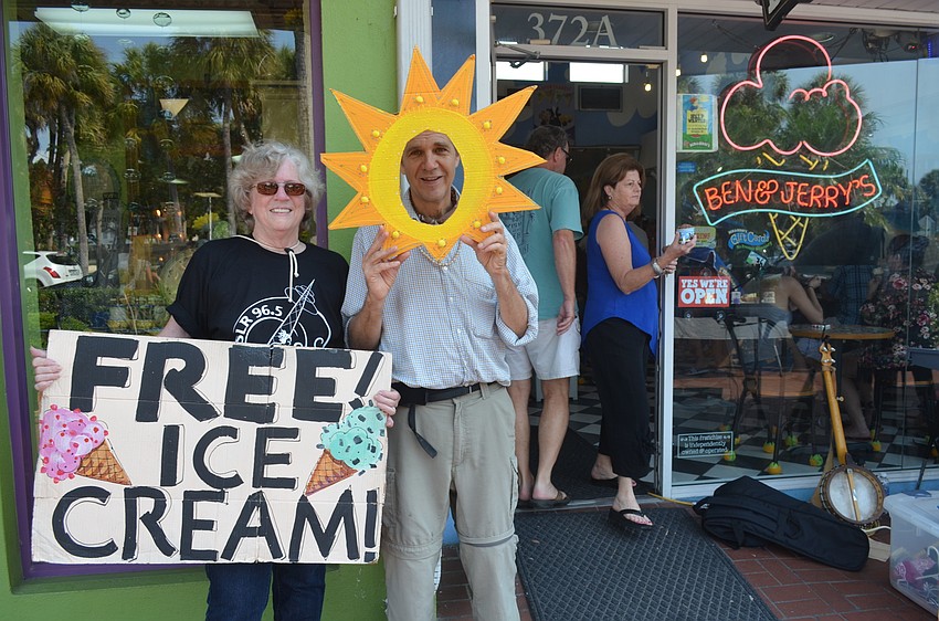 Jude Ritt and David Beaton, station manager of WSLR 96.5 radio station