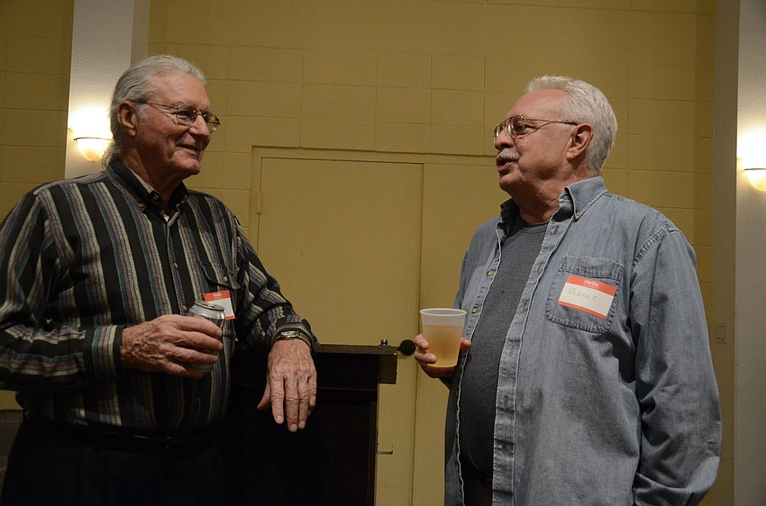 Jerry Laschinki and Bruce Harker chat before dinner.