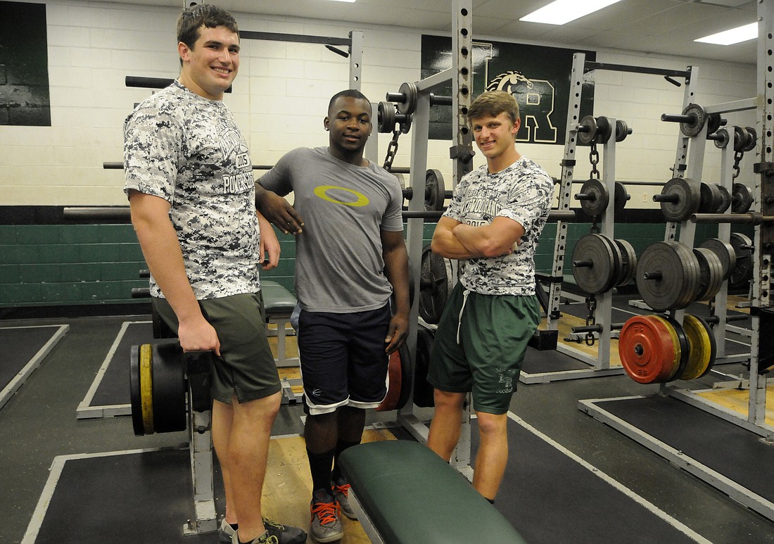 Gabriel Overmyer, Daron Lowery and Jamie Jeffcoat are all competing in the state weightlifting tournament for the first time.  Photo by Jen Blanco