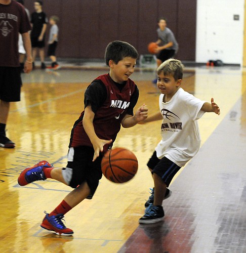 Nicholas Gesualdi and Nicholas Nesser go head-to-head in the one-on-one competition during last yearâ€™s Pirates Summer Basketball Camp.  File photo