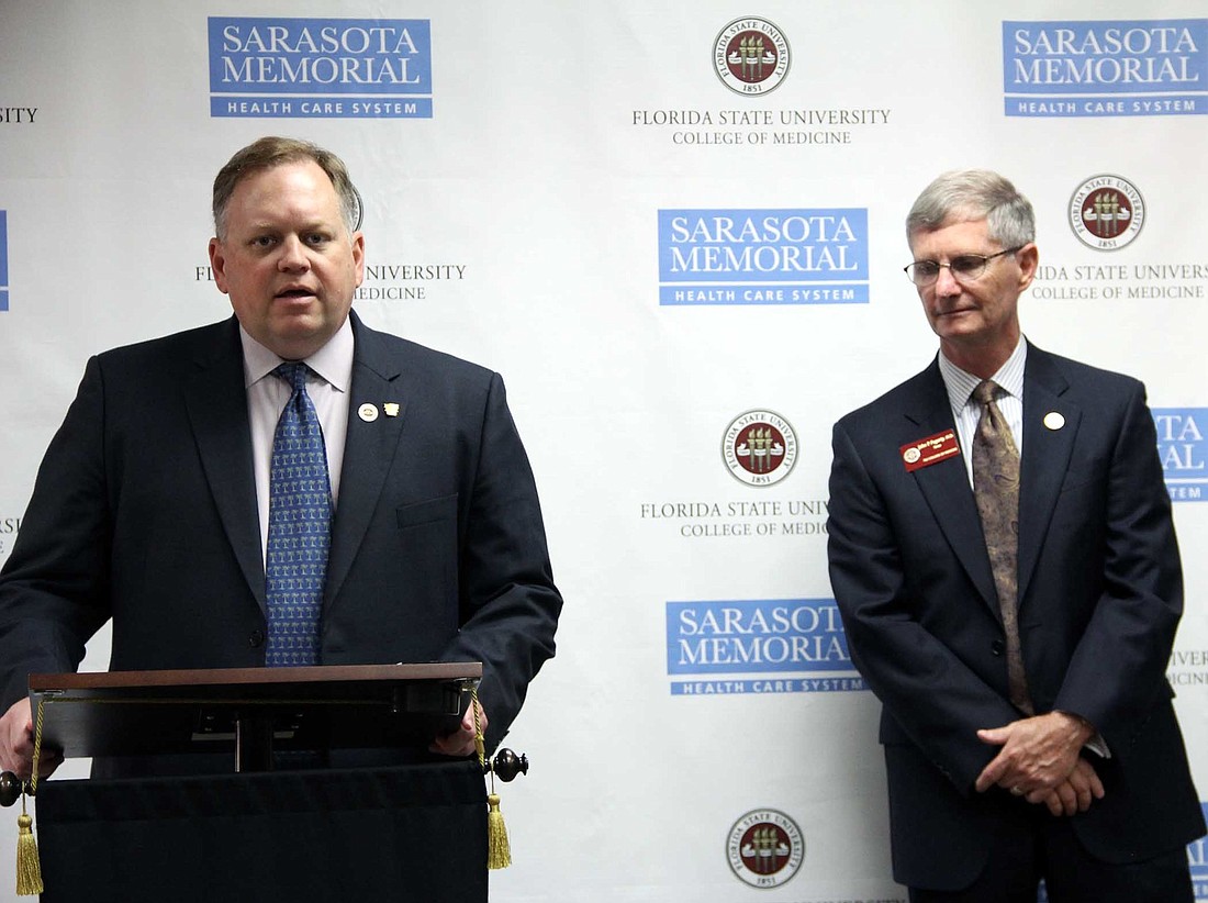 Sarasota Memorial CEO David Verinder with Dr. John Fogarty, dean of FSU College of Medicine and chair of the Council of Florida Medical School Deans. Photo courtesy of Sarasota Memorial Hospital.