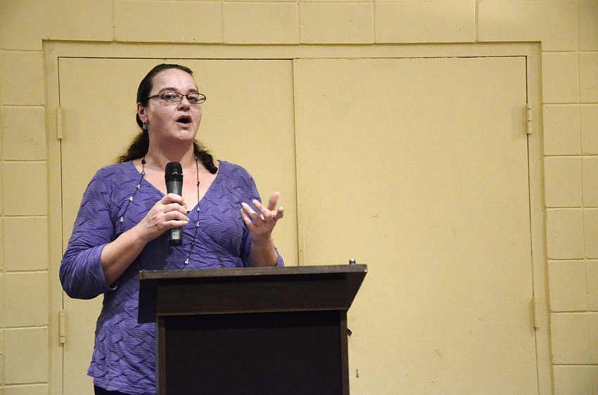 Stacey Roberts, board member, updated members about the entrance enhancement project.