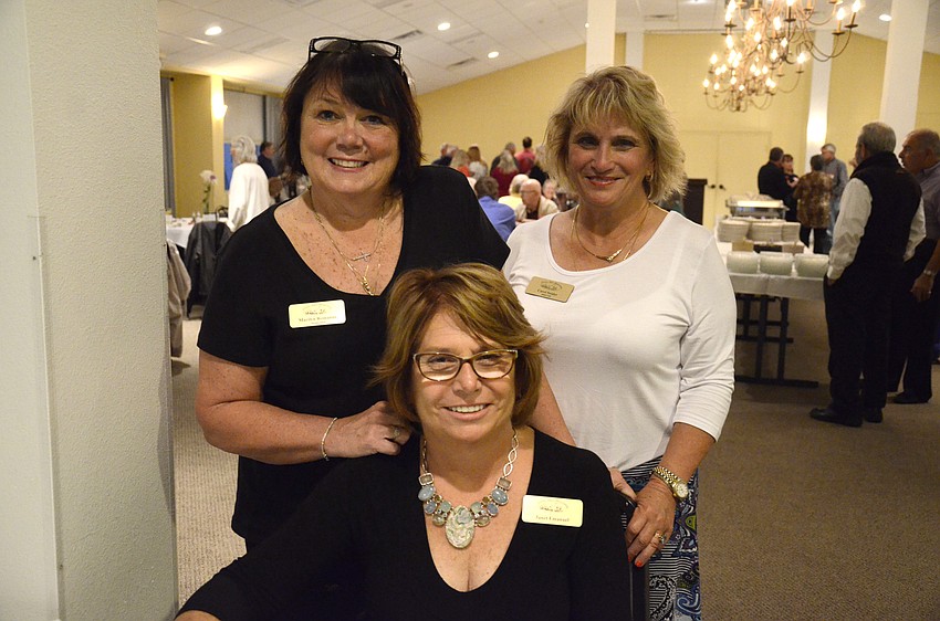 Marilyn Romanus, treasurer, Carol Snider, secretary, and Janet Emanuel, board member