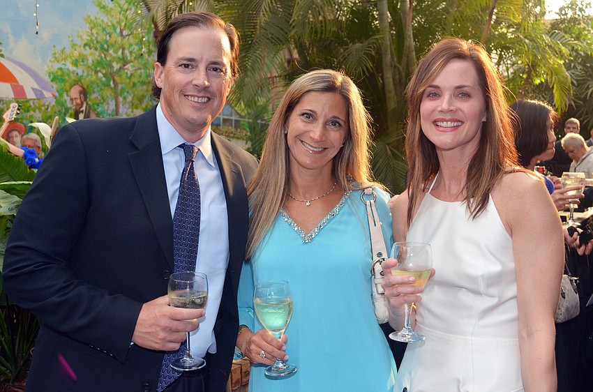 Scott and Julie Smith with Megan Otto