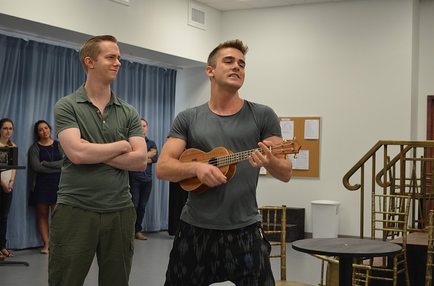 Cast members James David Larson and Erik Altemus  perform 