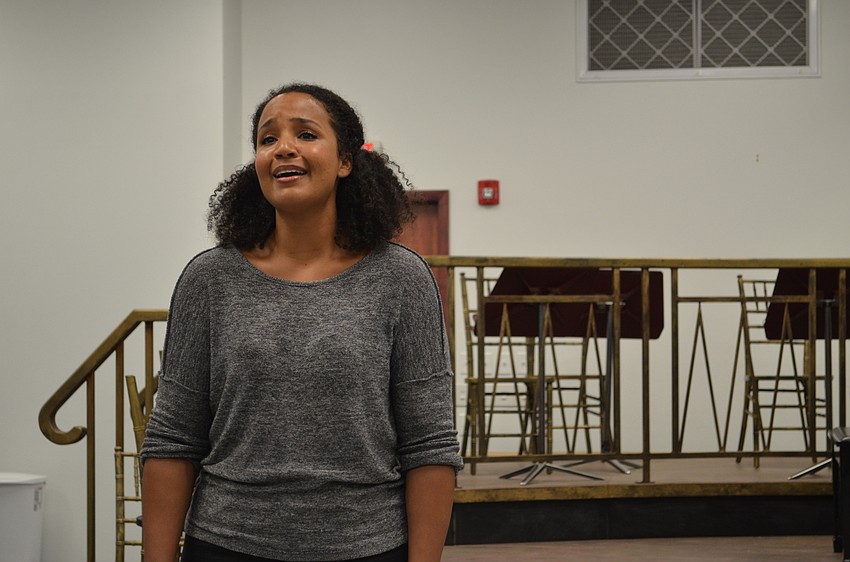 Stephanie Umoh singing a heartfelt ballad in a preview of 