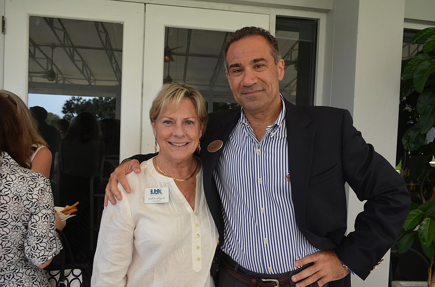 Chamber President Gail Loefgren and Jeff Mayers, of the Longboat Key Club